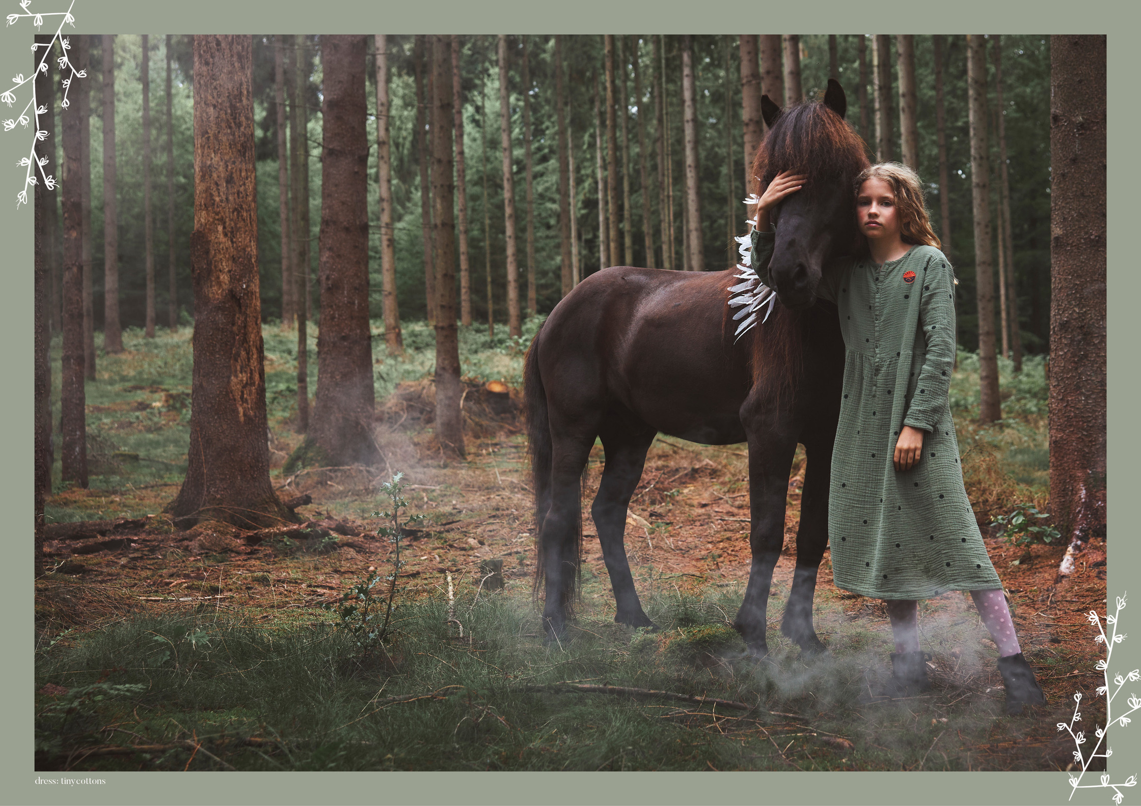 a girl is standing next to a horse in a forest