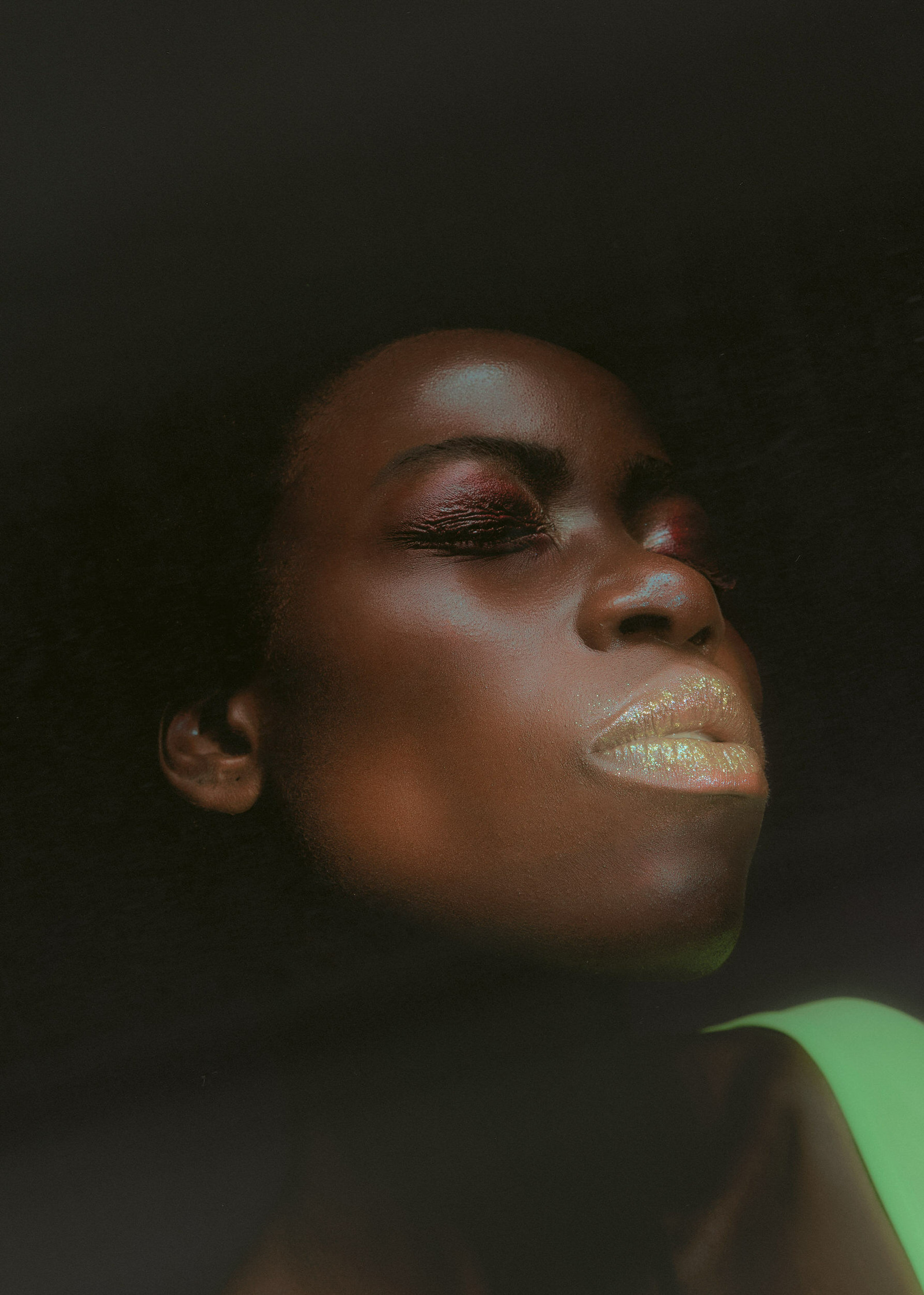 a portrait of a black woman with yellow lipstick