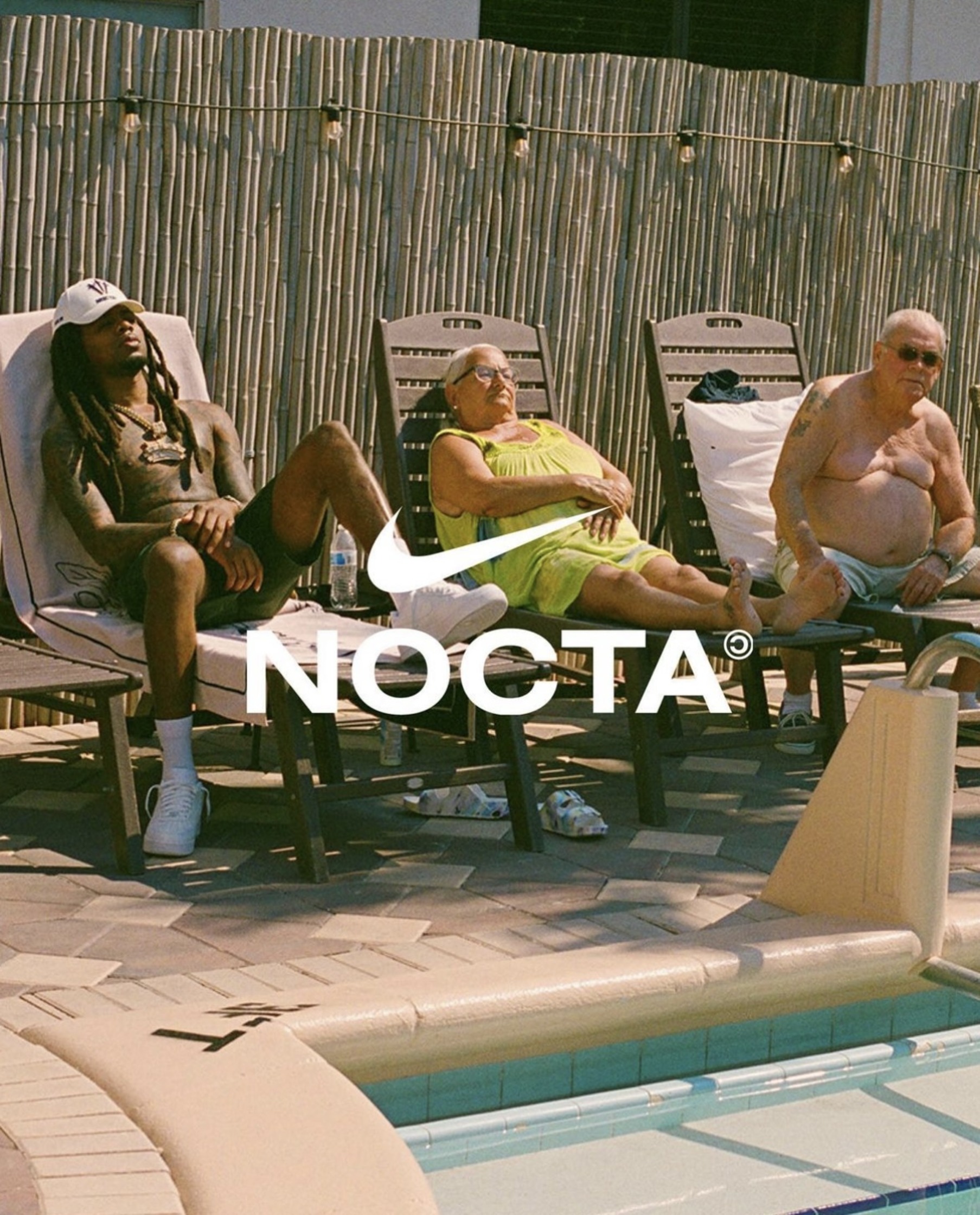 nike ad featuring a group of people lounging by a pool