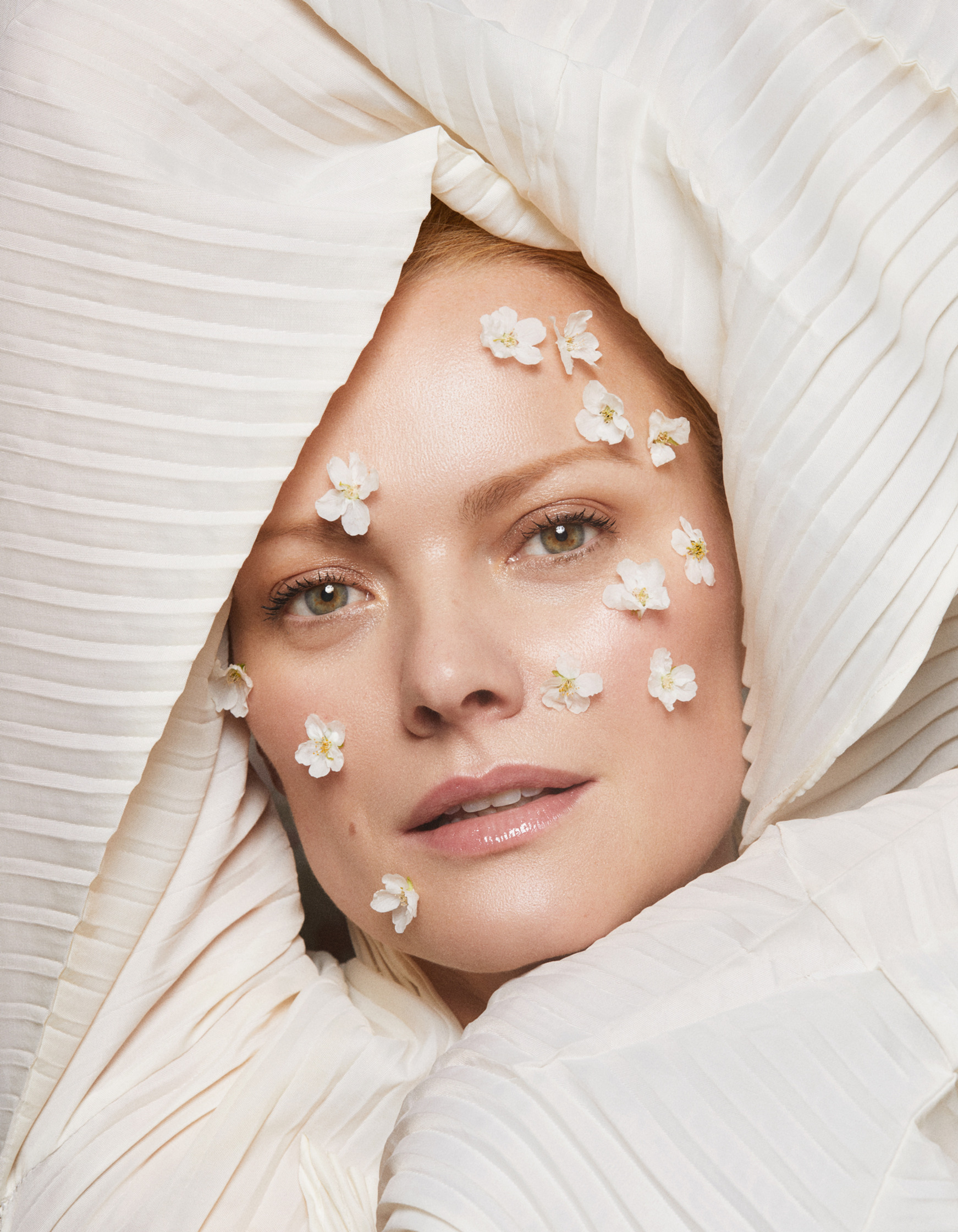 FRANZISKA KNUPPE  with white flowers on her face